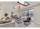 Sunroom with skylights, a neutral color scheme, and sliding glass doors that lead to the outdoor patio at 4682 Chatham St, Boulder, CO 80301