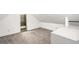 Carpeted bedroom featuring an en suite bathroom with a tiled shower at 3306 N Gilpin St, Denver, CO 80205