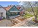 Aerial view of a green home with a landscaped yard, highlighting its curb appeal at 3306 N Gilpin St, Denver, CO 80205