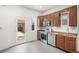 Functional kitchen features stainless appliances and backyard access at 3306 N Gilpin St, Denver, CO 80205