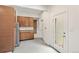 Clean kitchen with stainless steel refrigerator and light wood cabinets at 3306 N Gilpin St, Denver, CO 80205