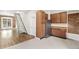 Open kitchen with stair access featuring stainless steel appliances at 3306 N Gilpin St, Denver, CO 80205