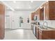 Bright kitchen boasts stainless steel appliances and backyard access at 3306 N Gilpin St, Denver, CO 80205