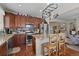 Well-appointed kitchen with a central island, stainless steel appliances, and pendant lighting at 10153 Pagosa St, Commerce City, CO 80022