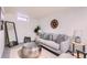 Cozy basement featuring modern decor, large mirror, and comfortable seating area at 3045 Kearny Street, Denver, CO 80207