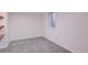 Empty basement featuring carpeted floors, natural light, and ample space at 3045 Kearny Street, Denver, CO 80207