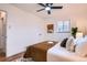 Bright bedroom featuring modern ceiling fan, hardwood floors, and stylish neutral decor at 3045 Kearny Street, Denver, CO 80207