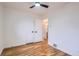 Bright bedroom featuring hardwood floors, natural light, and direct entry to hallway at 3045 Kearny Street, Denver, CO 80207