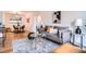 Inviting living room with hardwood floors, neutral colors, and dining area in the background at 3045 Kearny Street, Denver, CO 80207