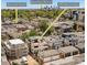 Aerial view of property at 3957 Utica Street with the skyline of Downtown Denver and Tennyson Street in the background at 3957 Utica St, Denver, CO 80212