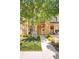 Charming home exterior with well-manicured lawn, stone accents, and inviting front entryway at 3957 Utica St, Denver, CO 80212