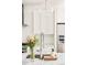 Bright kitchen featuring stainless steel appliances, sleek faucet, and elegant backsplash at 3957 Utica St, Denver, CO 80212