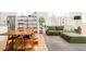Open-concept living space with modern kitchen, dining area, and comfortable lounge area at 3957 Utica St, Denver, CO 80212