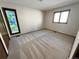 Bedroom with neutral carpet and windows that let in natural light at 53 Douglas S Dr, Broomfield, CO 80020
