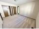 Cozy bedroom with neutral carpet and a large closet for ample storage at 53 Douglas S Dr, Broomfield, CO 80020