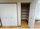 Spacious closet with custom shelving providing ample storage in bedroom at 53 Douglas S Dr, Broomfield, CO 80020