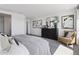 Bright bedroom with neutral color scheme, stylish furniture, and plenty of natural light at 13326 Blue Amber Ct, Parker, CO 80134
