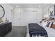 Tastefully designed bedroom with neutral accents, sliding closet, and gray carpet at 13326 Blue Amber Ct, Parker, CO 80134
