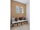 Cozy entryway nook with built-in bench seating and stylish storage baskets at 13326 Blue Amber Ct, Parker, CO 80134