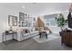 Cozy living room with comfortable seating, stylish decor, and a window for natural light at 13326 Blue Amber Ct, Parker, CO 80134