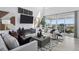 Elegant living room with stylish decor, comfortable seating, and sliding doors with a view at 13326 Blue Amber Ct, Parker, CO 80134