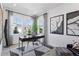 Inviting home office with ample natural light, stylish desk, and contemporary decor at 13326 Blue Amber Ct, Parker, CO 80134