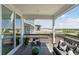 Cozy covered patio with stylish outdoor furniture, offering a perfect spot for relaxation and outdoor enjoyment at 13326 Blue Amber Ct, Parker, CO 80134