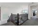 The home features a staircase with dark wood railings and a carpeted floor at 13326 Blue Amber Ct, Parker, CO 80134