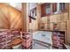 Small basement bathroom with brick walls and vintage sink at 2203 Bellaire St, Denver, CO 80207