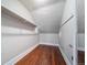 Spacious walk-in closet with built-in shelves and rod at 2203 Bellaire St, Denver, CO 80207