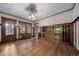 Spacious dining room with hardwood floors, built-in buffet, and large windows at 2203 Bellaire St, Denver, CO 80207