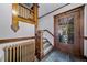 Elegant entryway with hardwood floors and staircase at 2203 Bellaire St, Denver, CO 80207