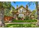 Front view of a 2 story home with a classic design at 2203 Bellaire St, Denver, CO 80207