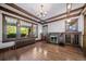 Bright living room with hardwood floors, fireplace and large windows at 2203 Bellaire St, Denver, CO 80207