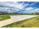 Community basketball court with mountain views and easy access to the Cherry Creek walking path at 9406 Bross St, Arvada, CO 80007