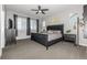 Comfortable bedroom with a large bed, neutral tones, and ample natural light at 9406 Bross St, Arvada, CO 80007