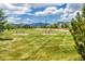 Expansive green space with picnic tables, manicured lawn, and mountain views at 9406 Bross St, Arvada, CO 80007