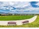Picturesque walking path with benches and views of the neighborhood and distant mountains at 9406 Bross St, Arvada, CO 80007
