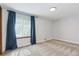 Bright bedroom features neutral walls, carpet, window with curtains and plenty of natural light at 5370 S Flanders Way, Centennial, CO 80015