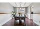 Cozy dining room featuring hardwood floors and natural light, creating an inviting atmosphere for dining at 5370 S Flanders Way, Centennial, CO 80015