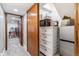 Hallway with a dresser, microwave and mini fridge at 5370 S Flanders Way, Centennial, CO 80015