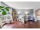 Spacious living room with hardwood floors and a playful setup, creating a versatile living space at 5370 S Flanders Way, Centennial, CO 80015