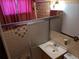 Small bathroom with a shower, tile walls, and sink vanity at 5370 W Arizona Pl, Lakewood, CO 80232