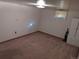 Simple bedroom with carpet flooring, a small window, and closet space at 5370 W Arizona Pl, Lakewood, CO 80232