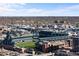 Expansive aerial view capturing the sports stadium nestled in a dense urban landscape at 1750 Wewatta St # 1301, Denver, CO 80202