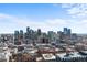 Sweeping city view showing the downtown skyline against a clear blue sky at 1750 Wewatta St # 1301, Denver, CO 80202