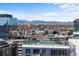 Stunning city view with rooftop pool and snow-capped mountains in the background at 1750 Wewatta St # 1301, Denver, CO 80202
