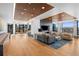 Expansive lounge area with comfortable seating, a large TV, and contemporary design at 1750 Wewatta St # 1301, Denver, CO 80202