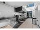 Modern outdoor kitchen features stainless steel appliances and sink at 1750 Wewatta St # 1301, Denver, CO 80202