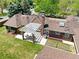 Aerial view of the home, backyard, and patio area with a white pergola at 2500 Locust St, Denver, CO 80207